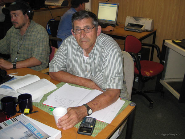 Art Wright, Party Chief of the Williamson and Associates search team, working in the survey room.